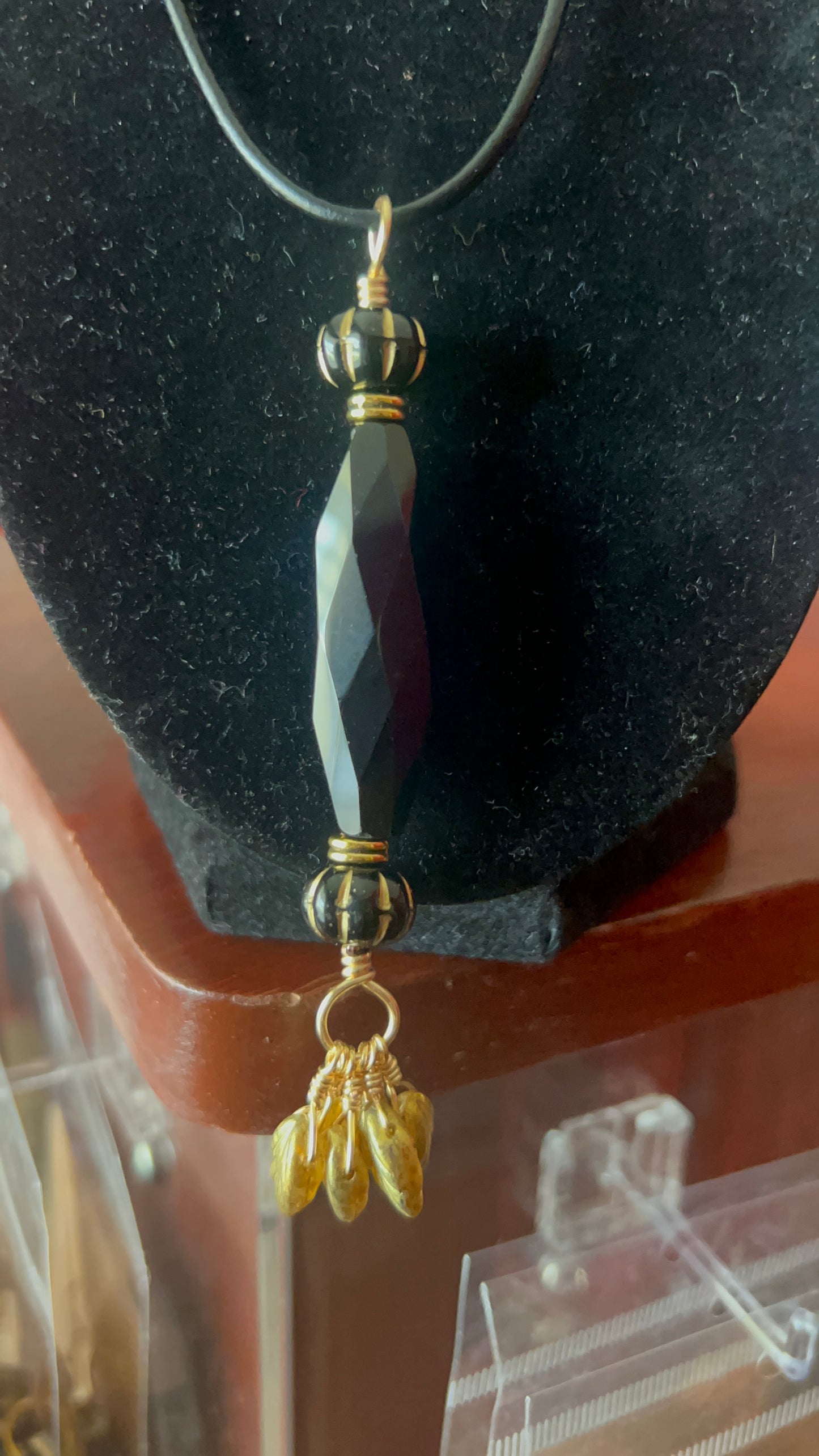 Black Crystal with Gold leaves Pendant on black leather 25 inch necklace - pendant is 4 inches