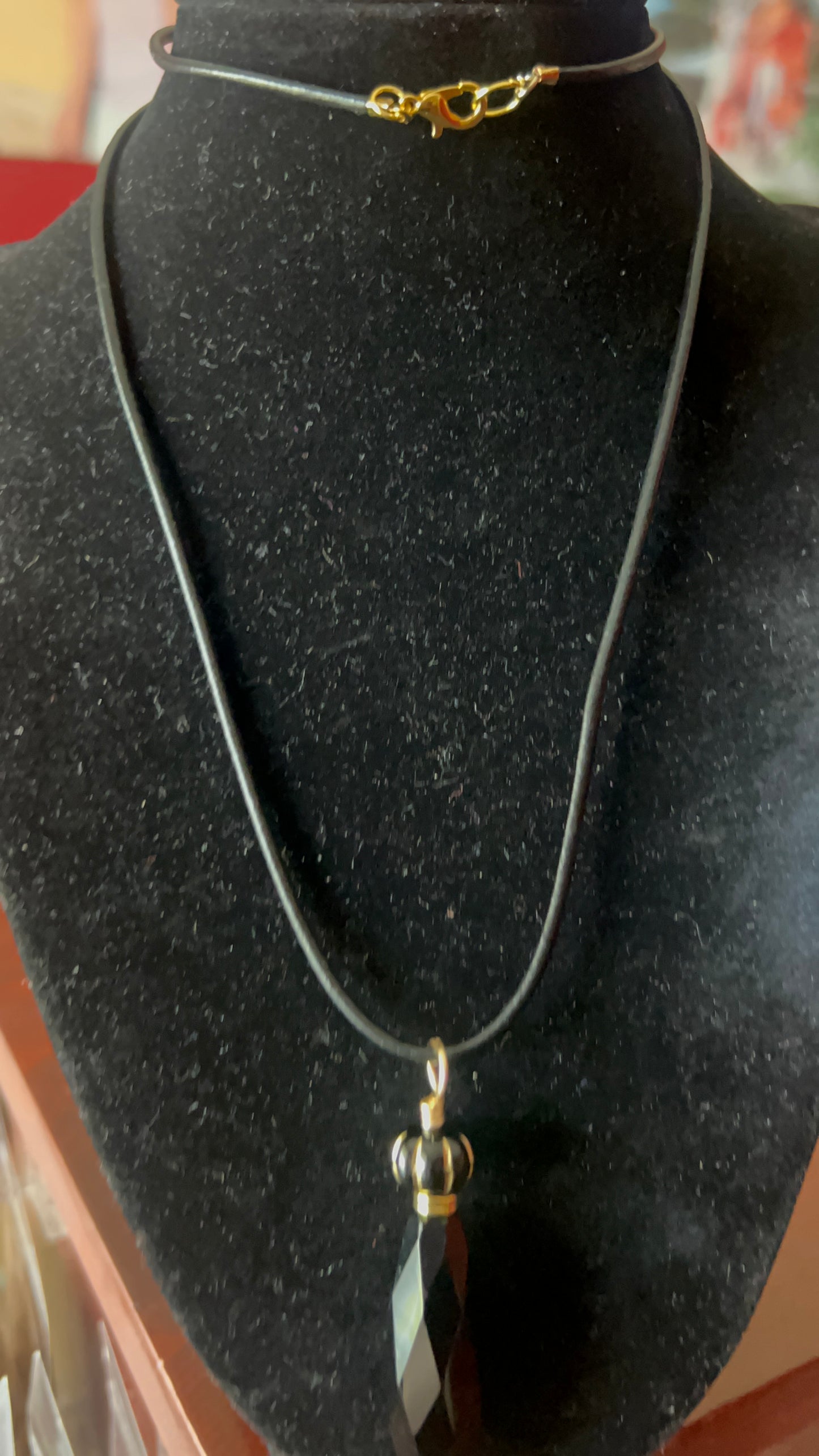 Black Crystal with Gold leaves Pendant on black leather 25 inch necklace - pendant is 4 inches