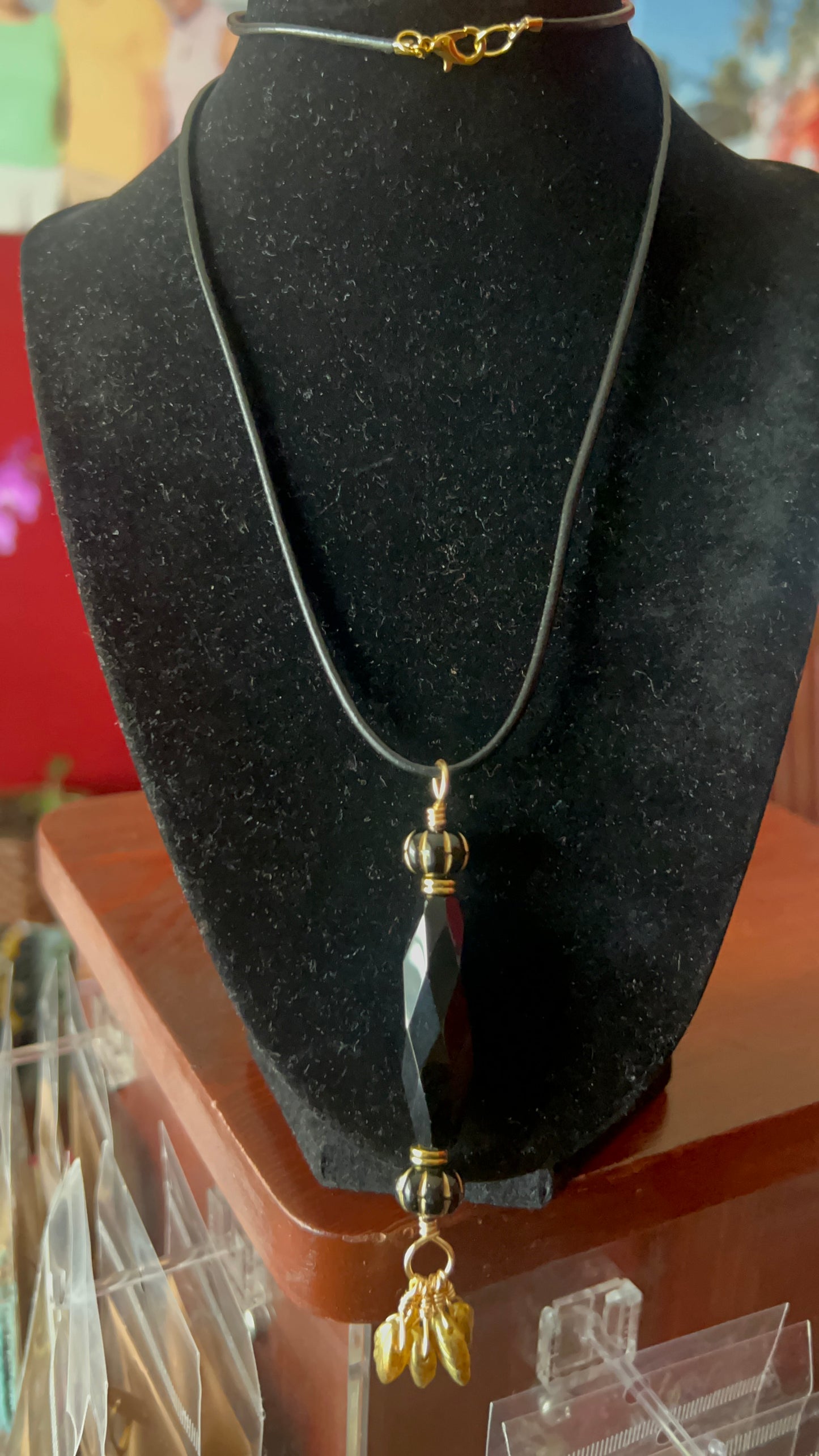 Black Crystal with Gold leaves Pendant on black leather 25 inch necklace - pendant is 4 inches