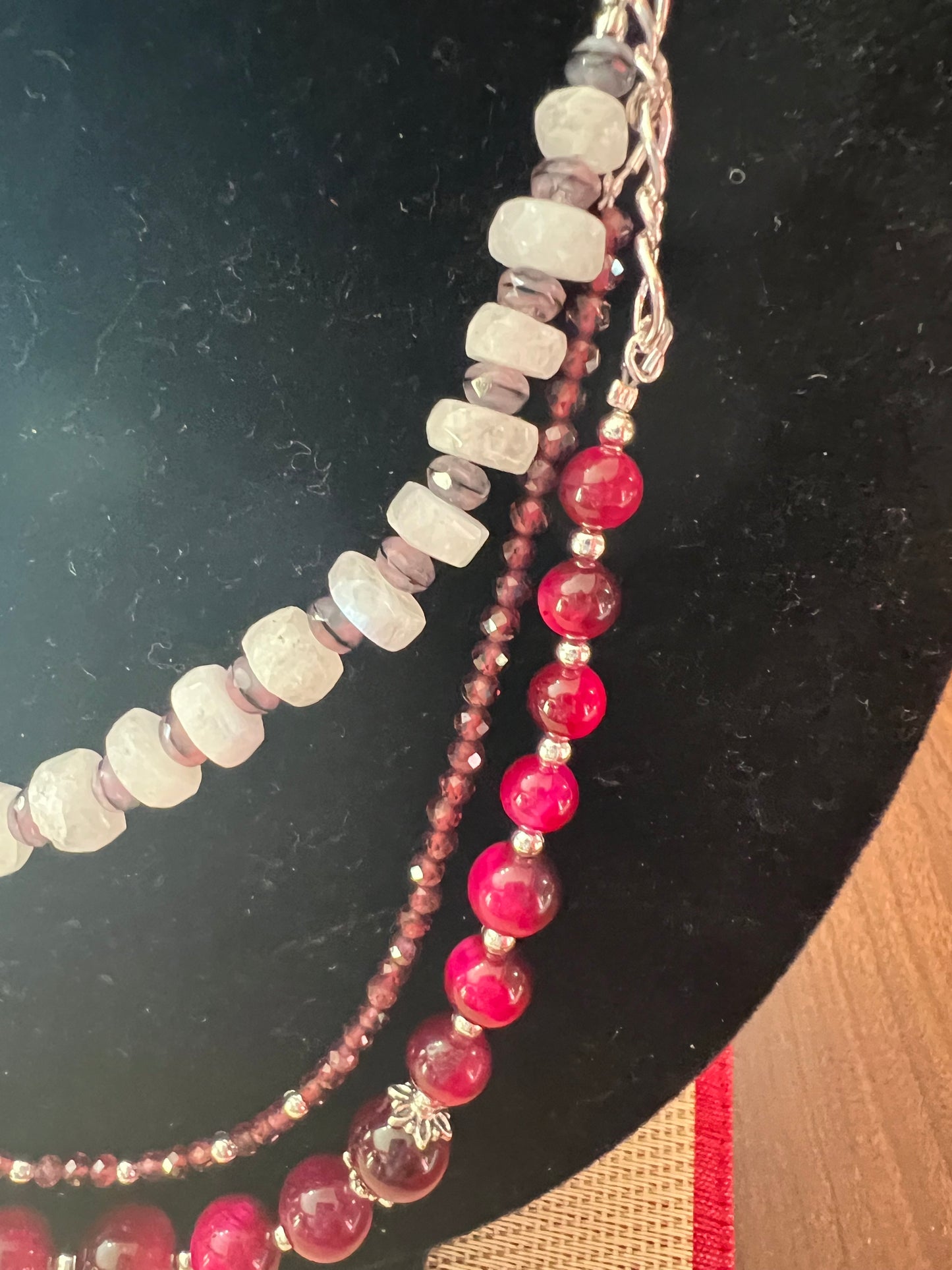 Indian-Cut Moonstone, Fuchsia Tiger Eye, Red Garnet, Jet Black/Pink Silk Mix Rondelles Beautiful Three-Strand Necklace with silver chain and matching Earrings