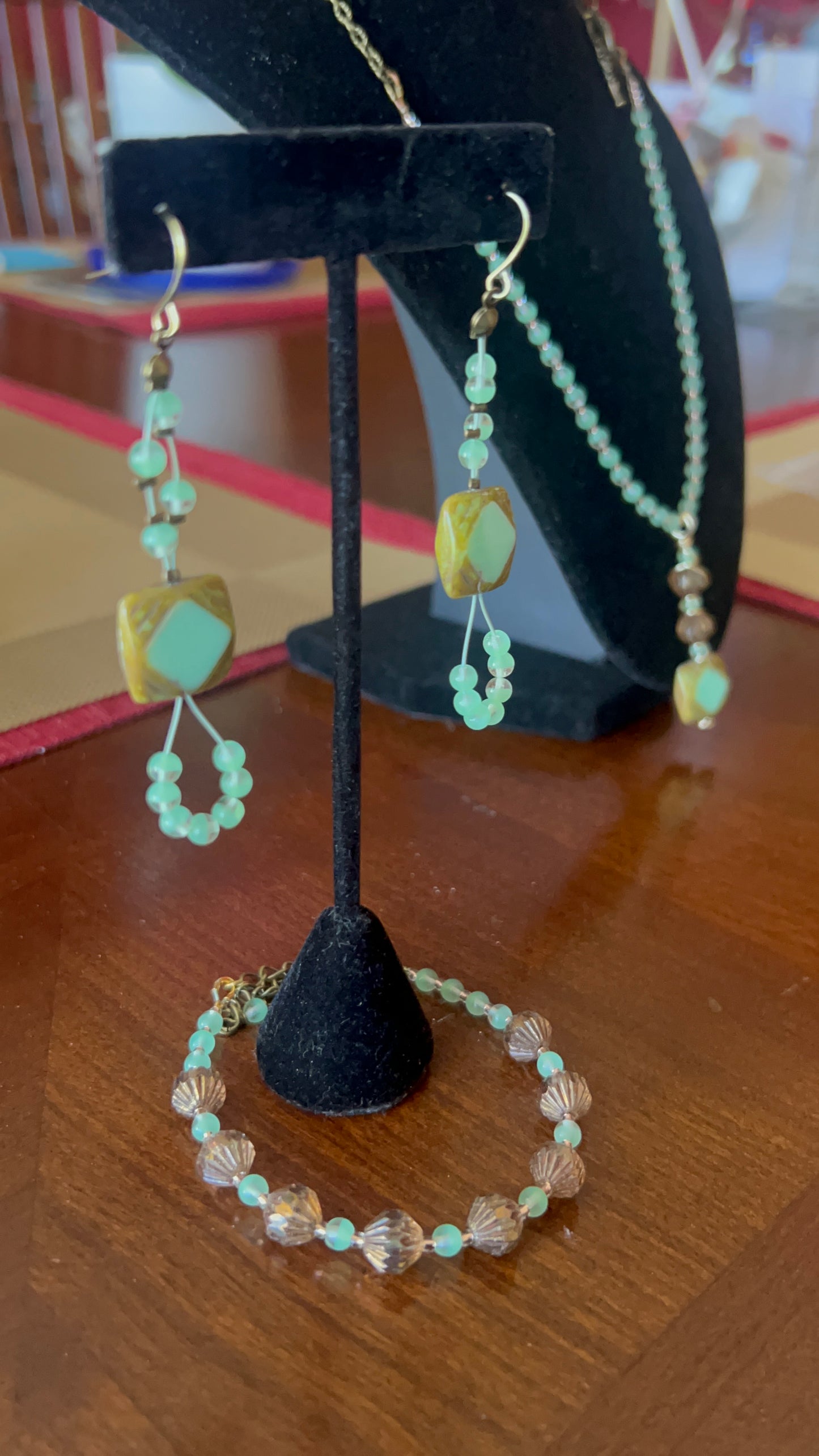 Square Mint Silk Picasso, peridot and Bronze Crystal Focal 24 inch Necklace with front closing brass Tierra Cast Butterfly Toggle; 6 1/2-8 1/2 Bracelet; Long Dangle Earrings