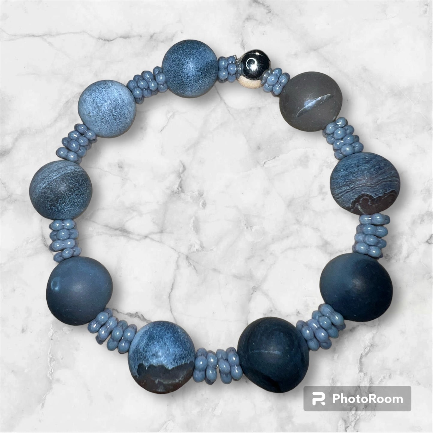 Blue Matte Agate Beads with Flower Spacers and silver Stretch Bracelet