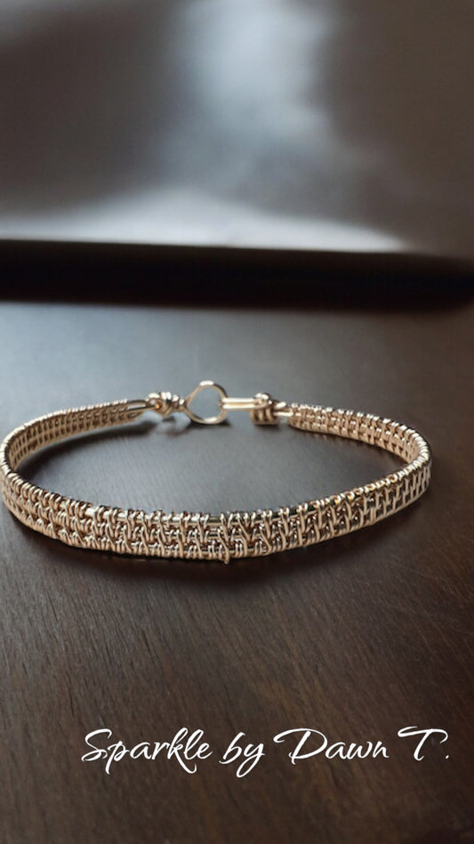 Gold woven bangle