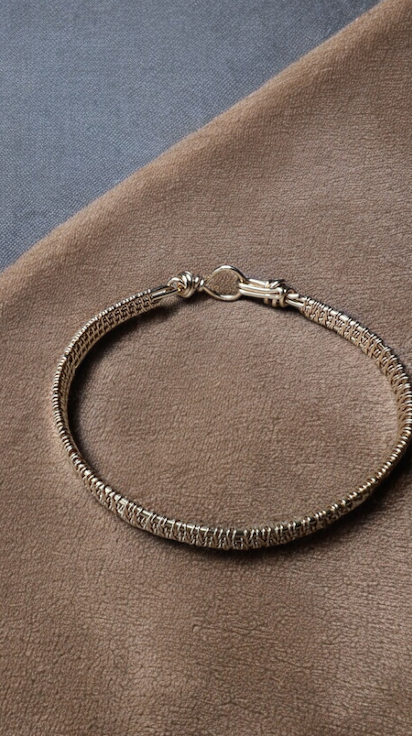 Gold woven bangle