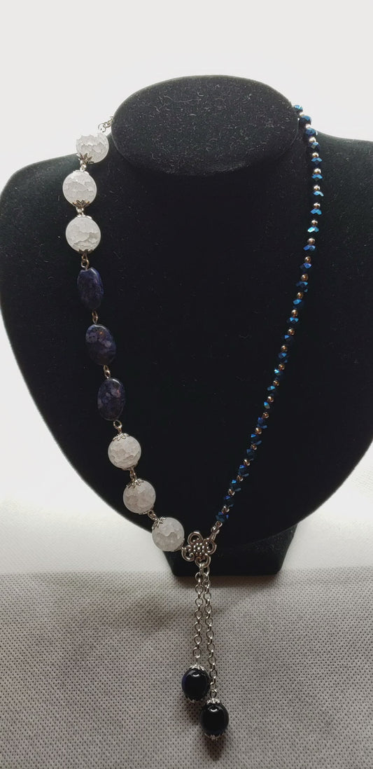 White Quartz, Blue Sodelite, Blue crystals with antique silver fixtures and silver chain. Asymmetrical Necklace