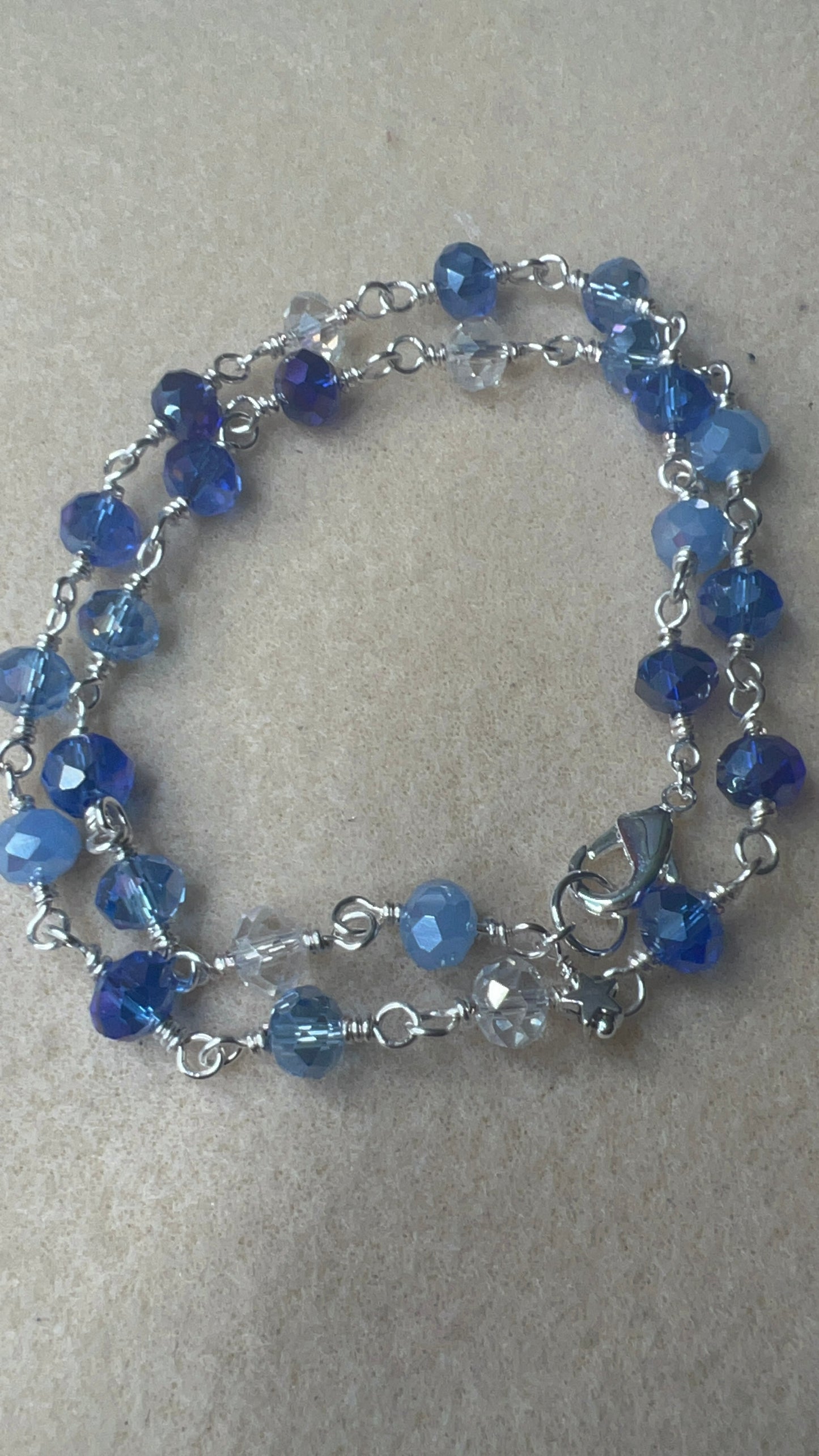 18 inch shades of blue and clear crystal necklace with silver clasp