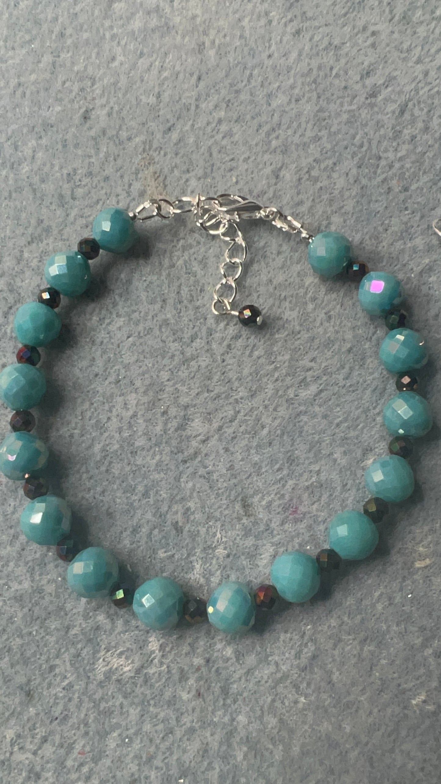 Teal Crystals and Hematite with silver Bracelet with matching Teardrop Earrings