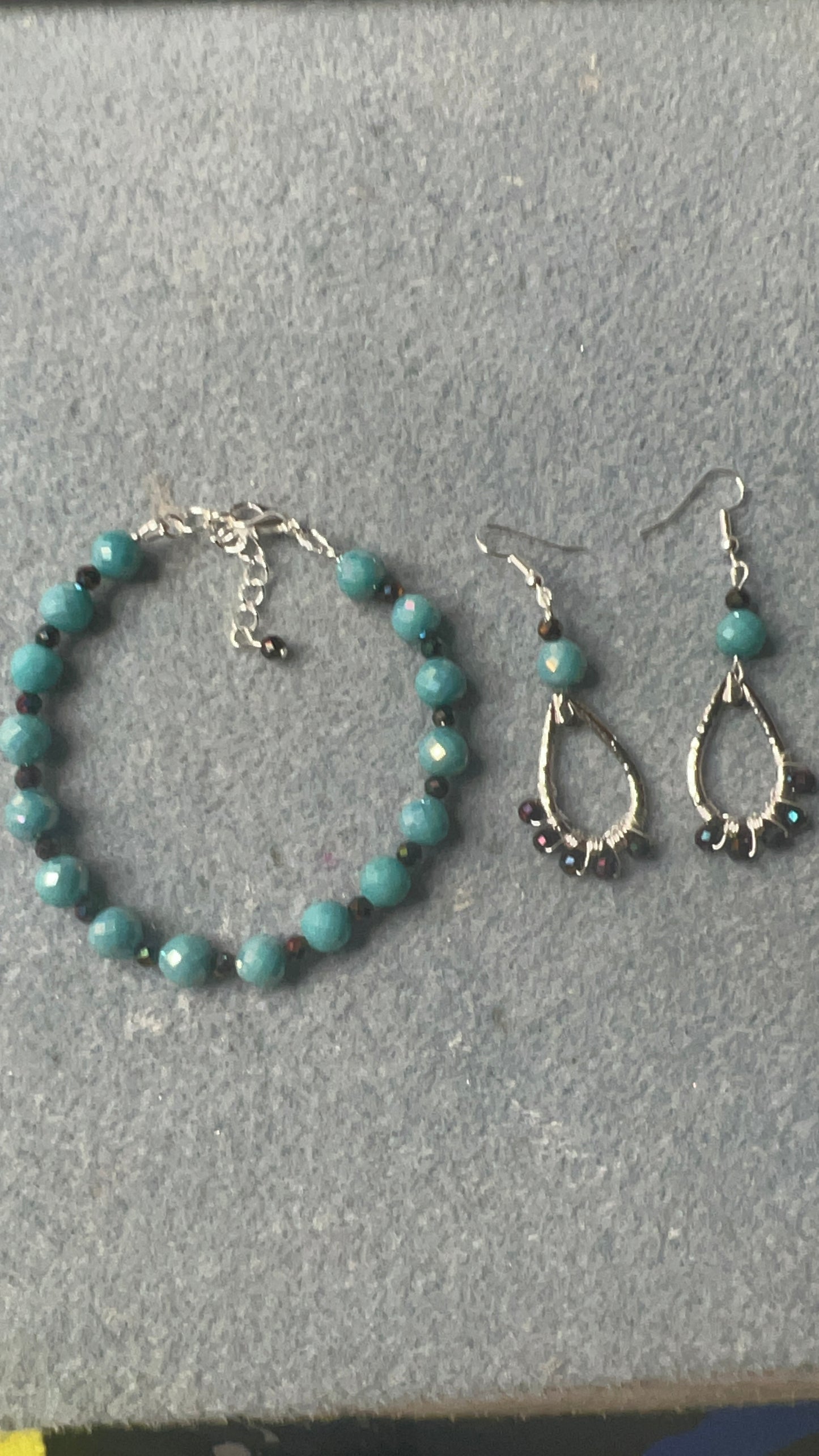 Teal Crystals and Hematite with silver Bracelet with matching Teardrop Earrings