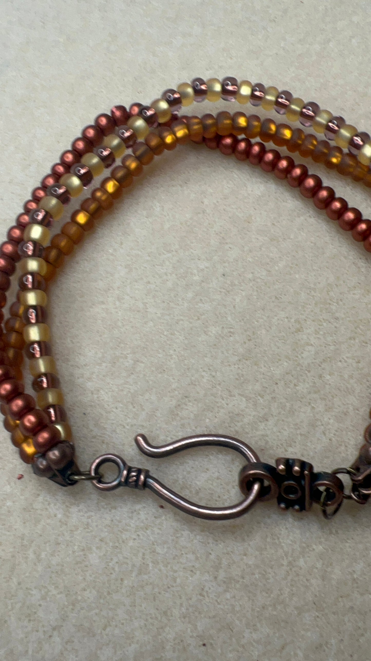 Triple Strand Bracelet with Hook Closure - Matte Gold, Matte Bronze, Yellow and Bronze Beads