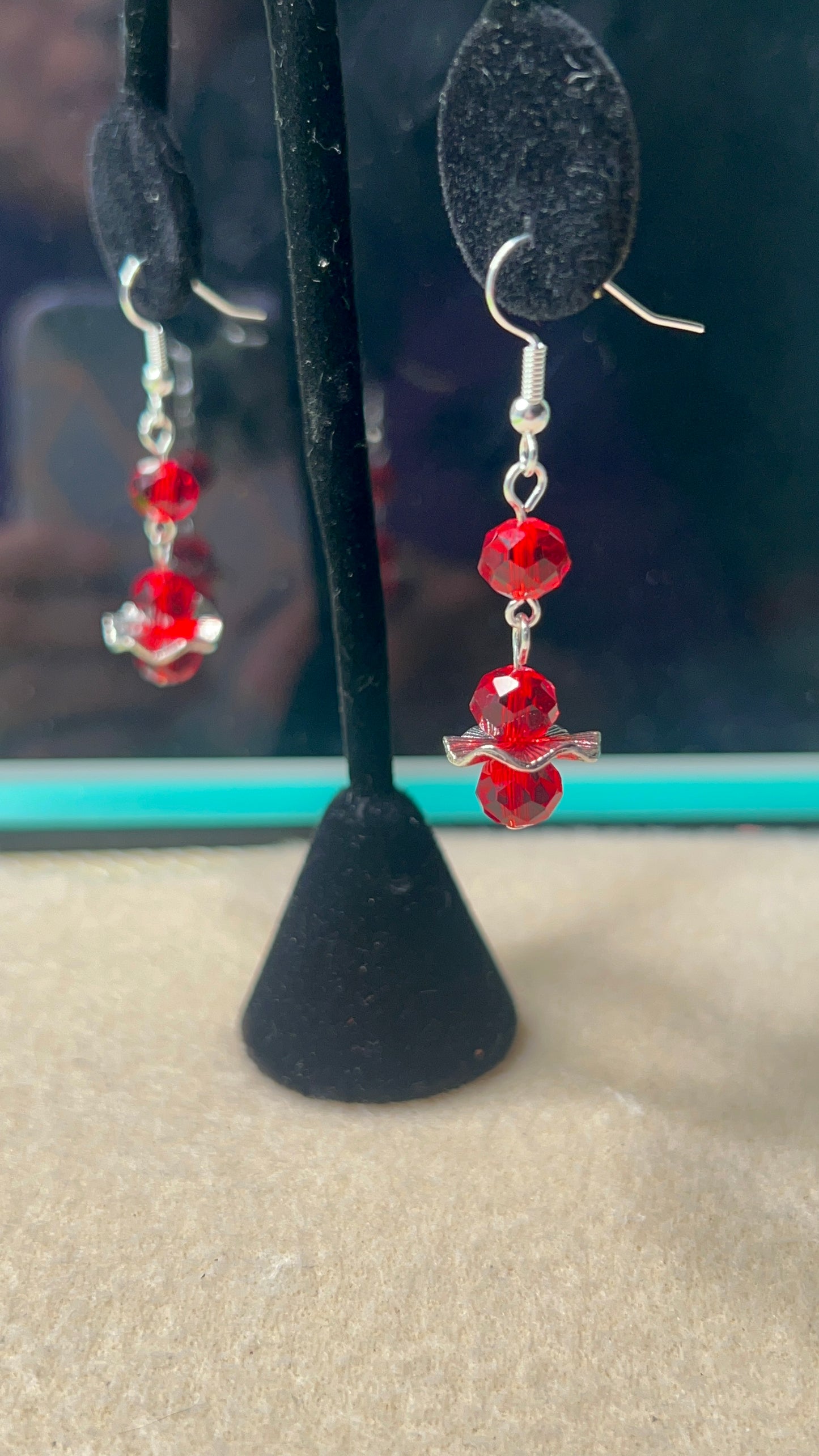 Red Crystal with Silver Swirvy Spacer Earrings