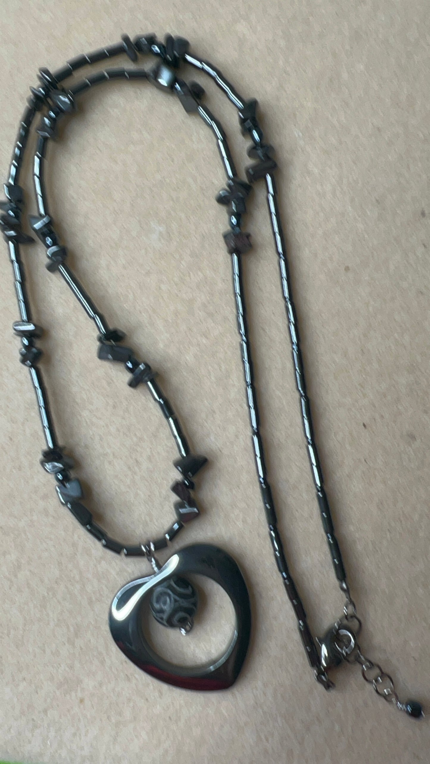 Carved Jade in Hematite Heart Pendant on Hematite Necklace with matching earrings