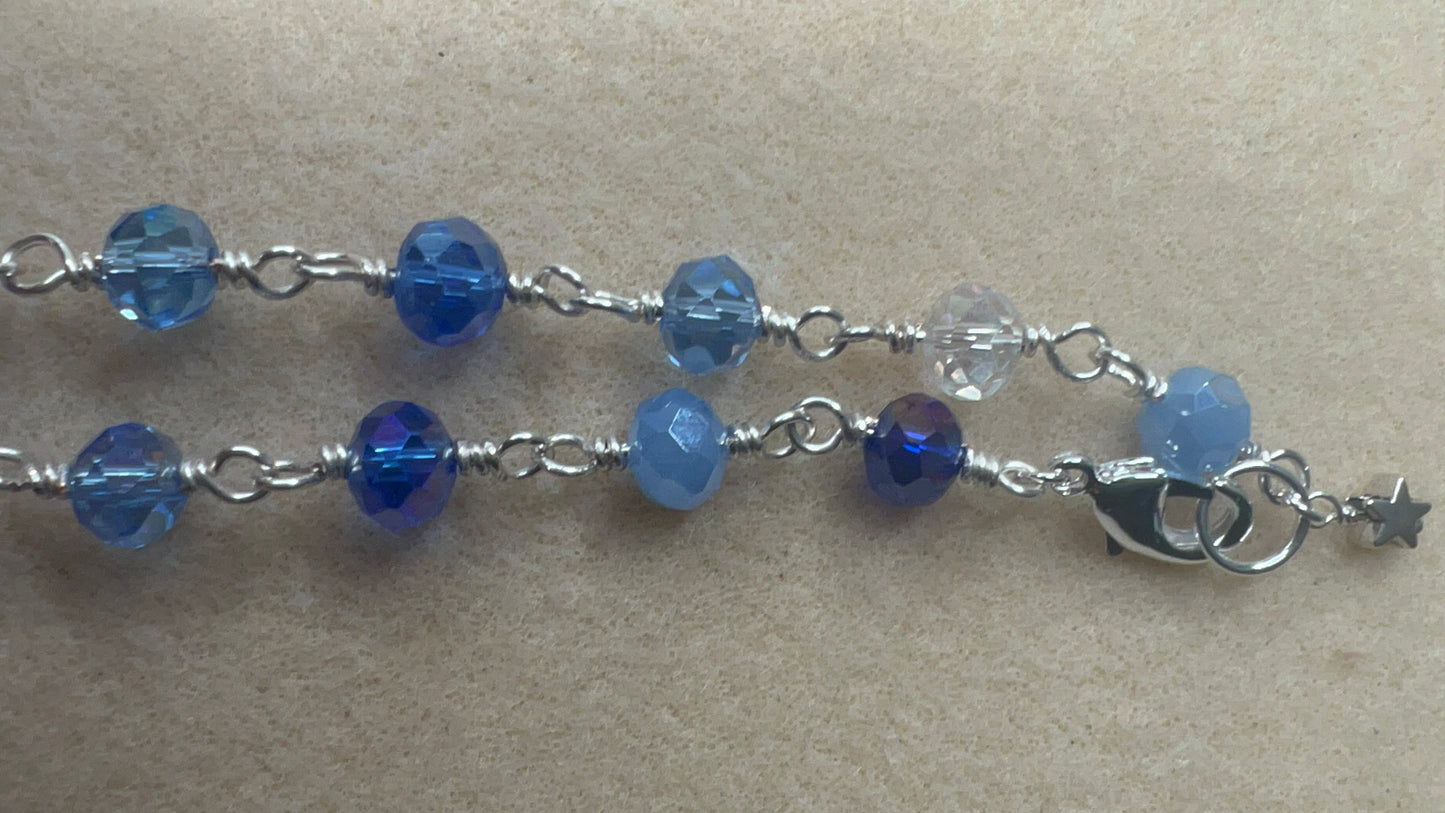 18 inch shades of blue and clear crystal necklace with silver clasp