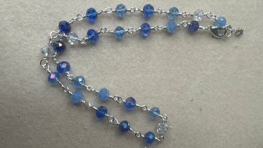 18 inch shades of blue and clear crystal necklace with silver clasp