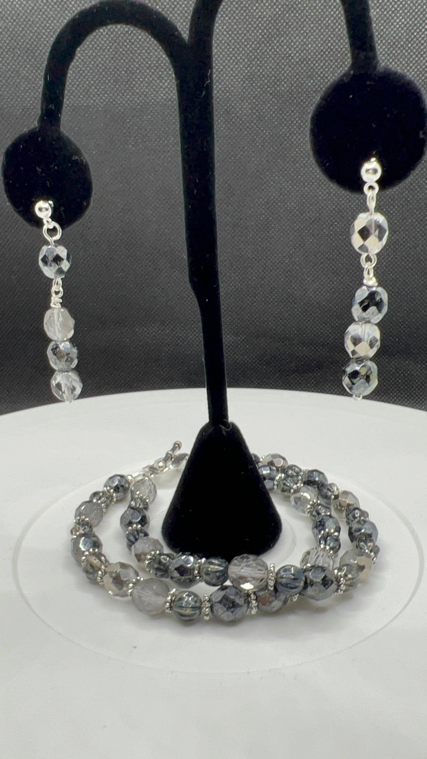 Black speckled and silver double bracelet with heart clasp and earrings