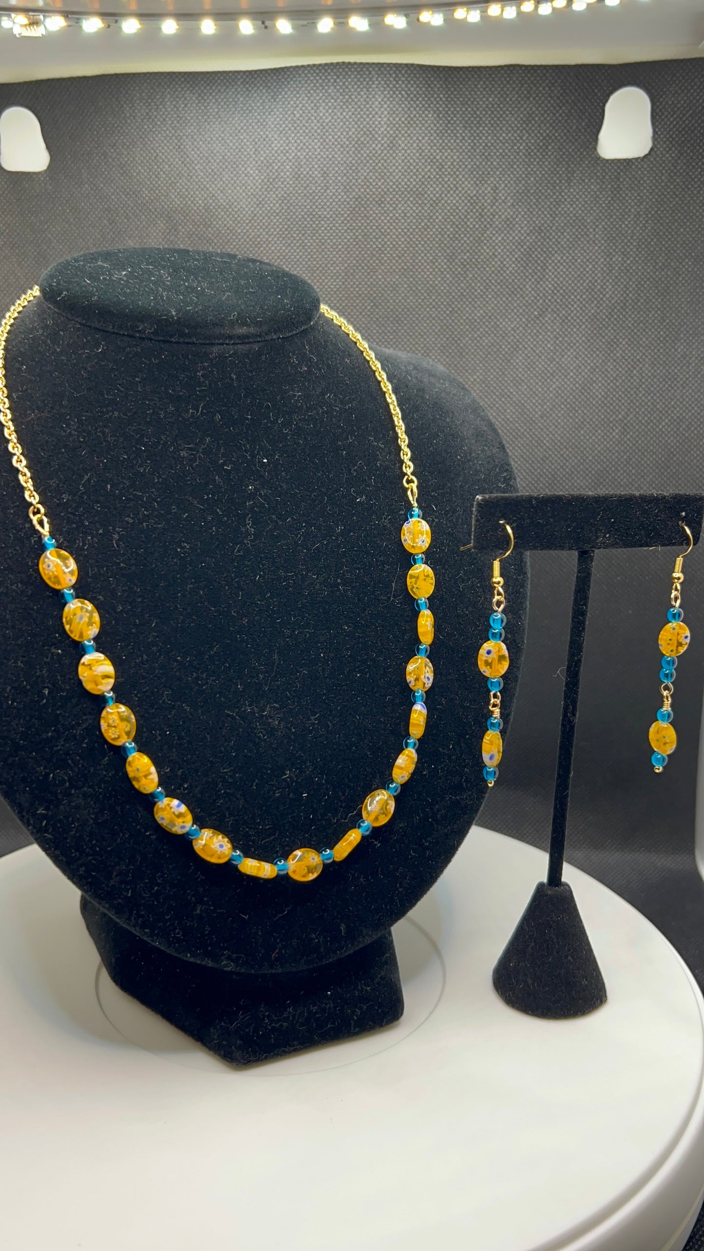 Cobalt Orange, White and Royal Blue Speckled Necklace with Gold Chain and matching earrings