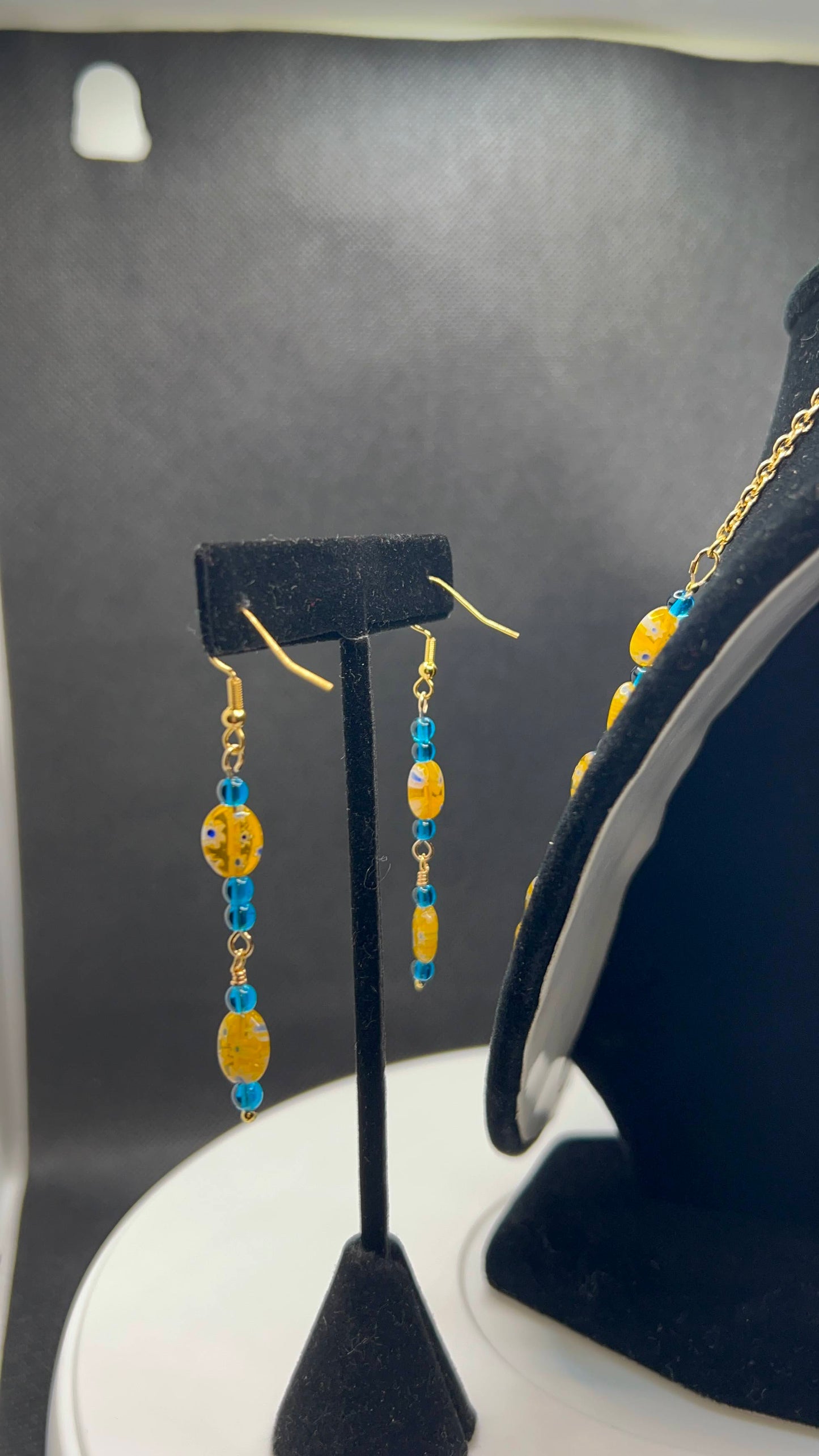 Cobalt Orange, White and Royal Blue Speckled Necklace with Gold Chain and matching earrings