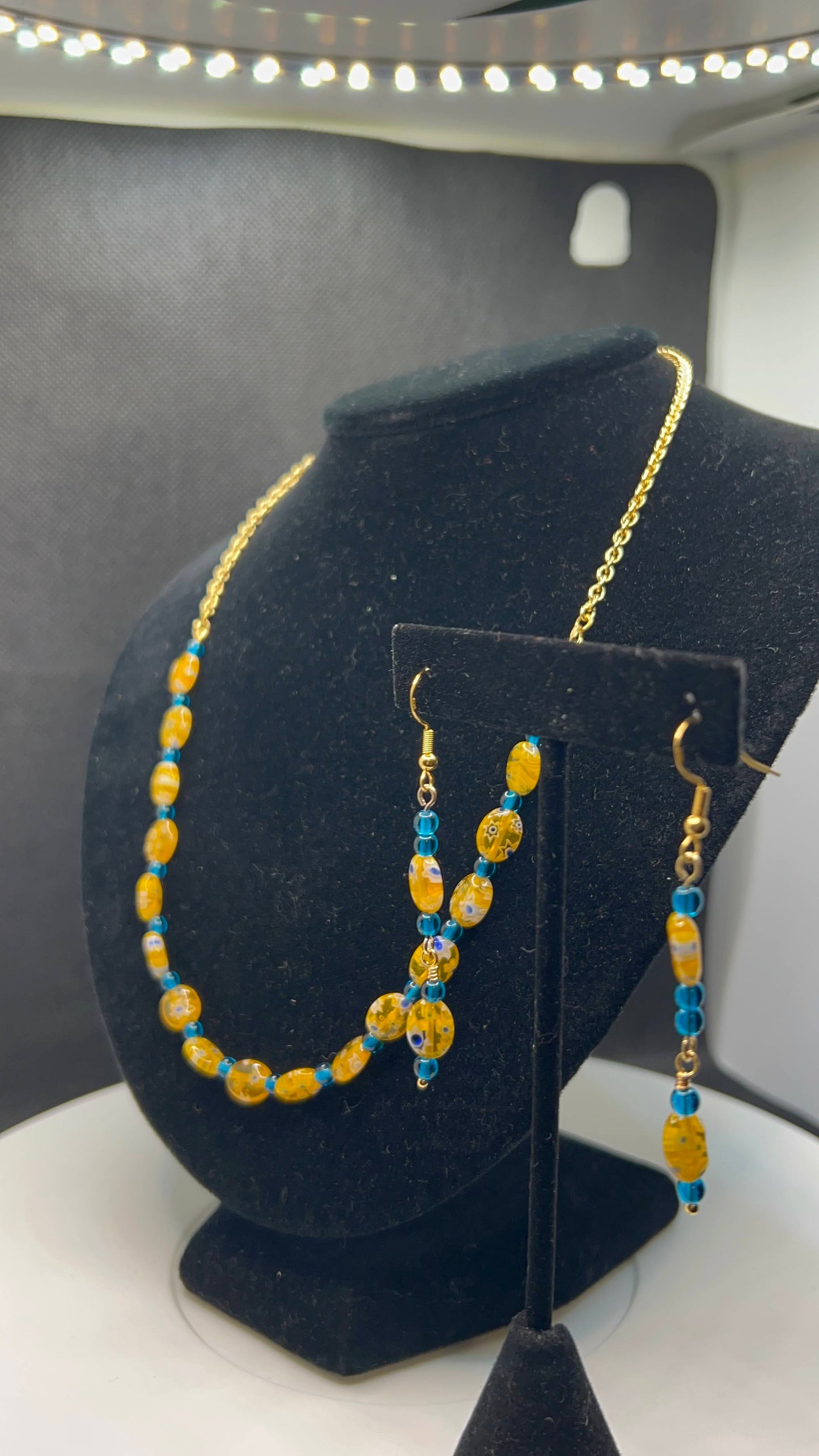 Cobalt Orange, White and Royal Blue Speckled Necklace with Gold Chain and matching earrings