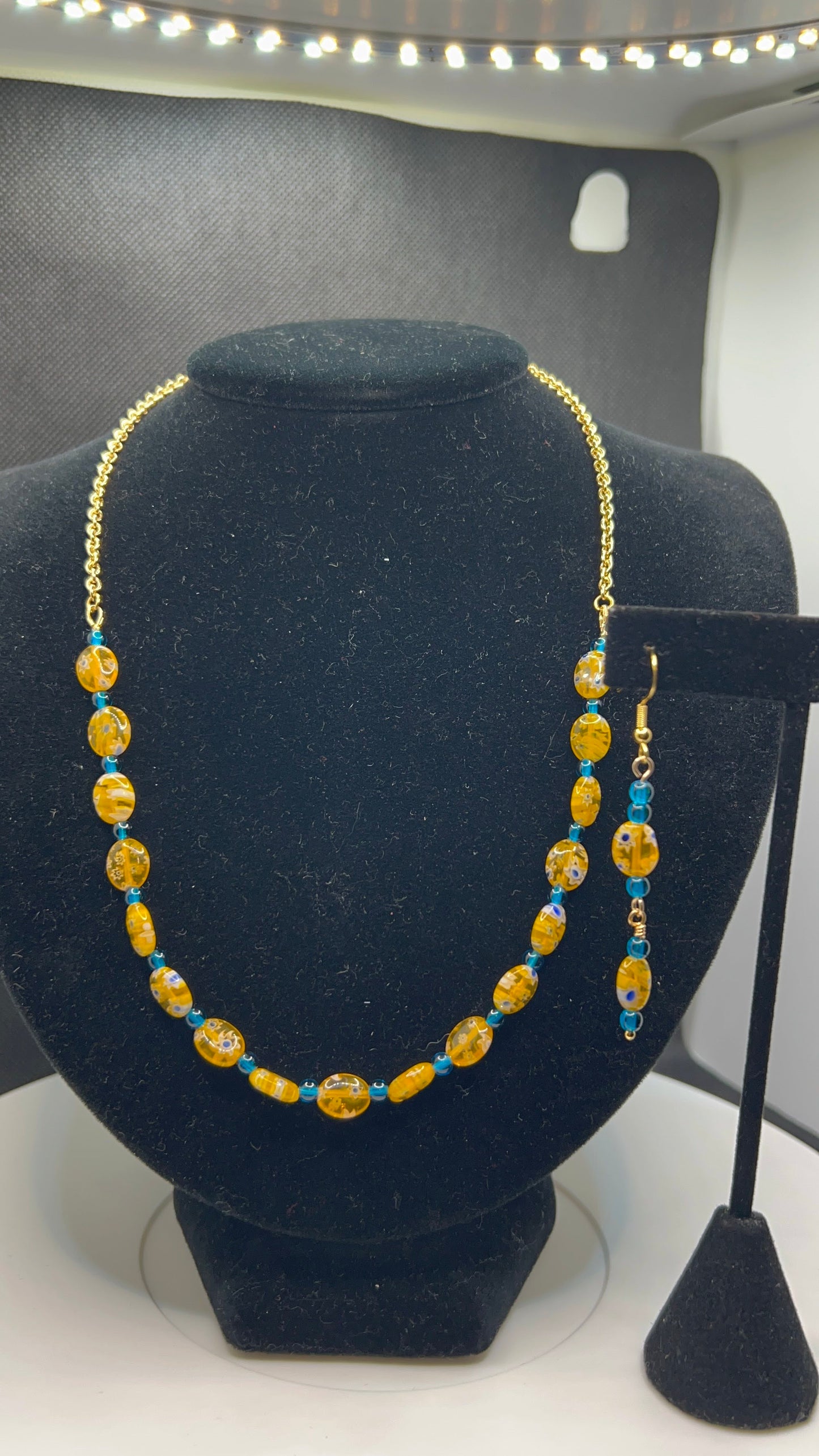 Cobalt Orange, White and Royal Blue Speckled Necklace with Gold Chain and matching earrings