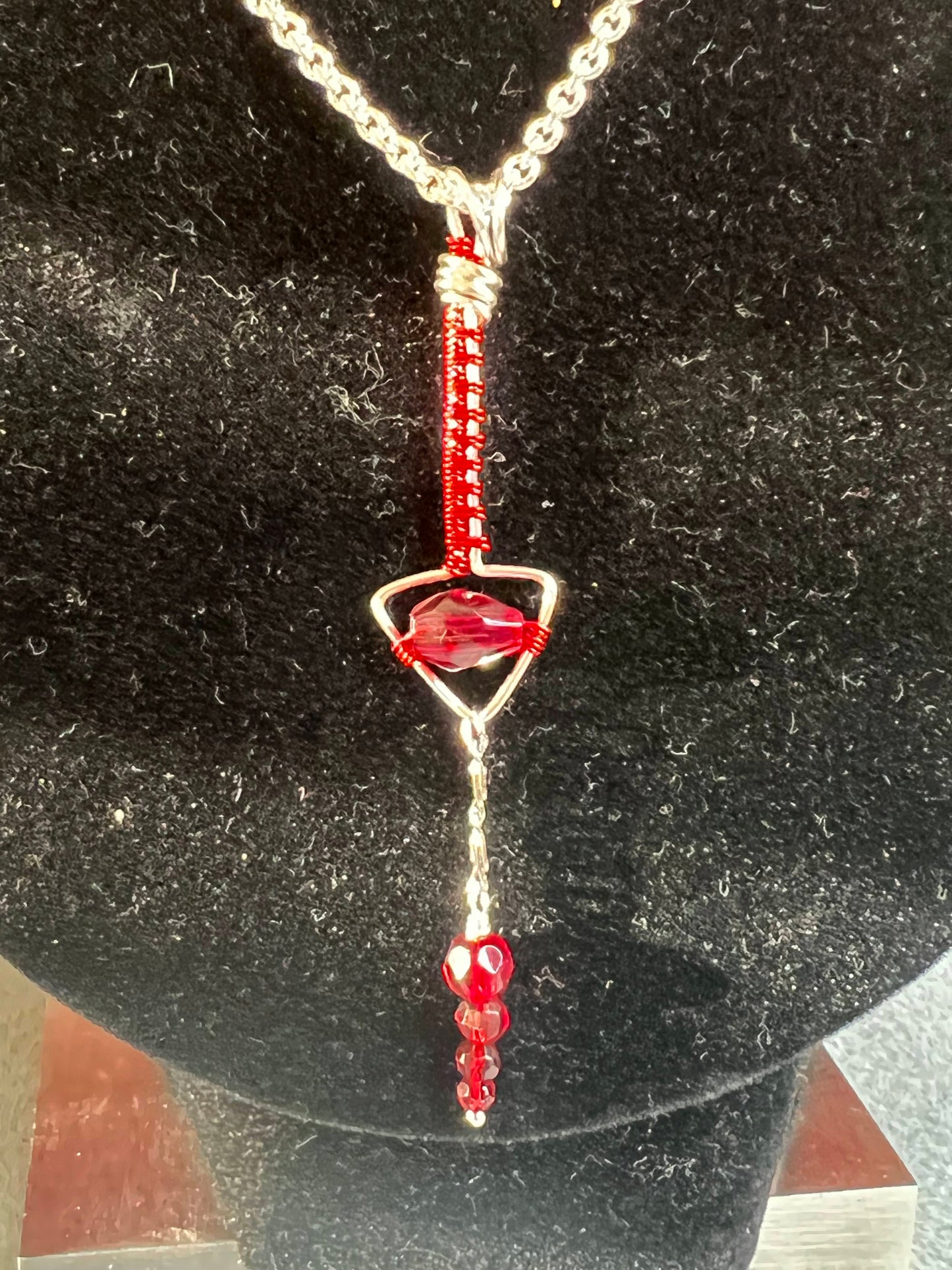 Red and Silver woven arrow with red crystals pendant necklace