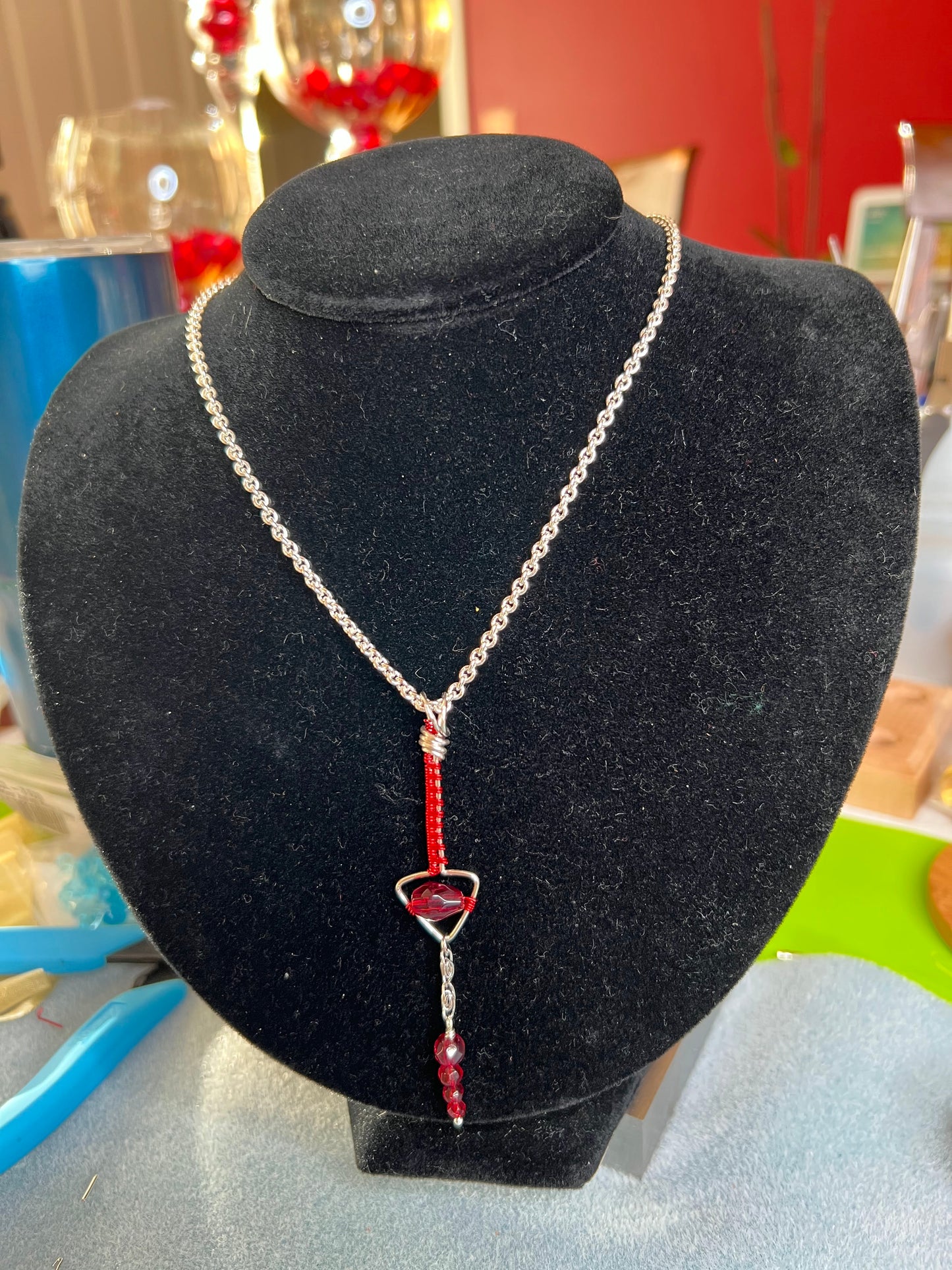 Red and Silver woven arrow with red crystals pendant necklace