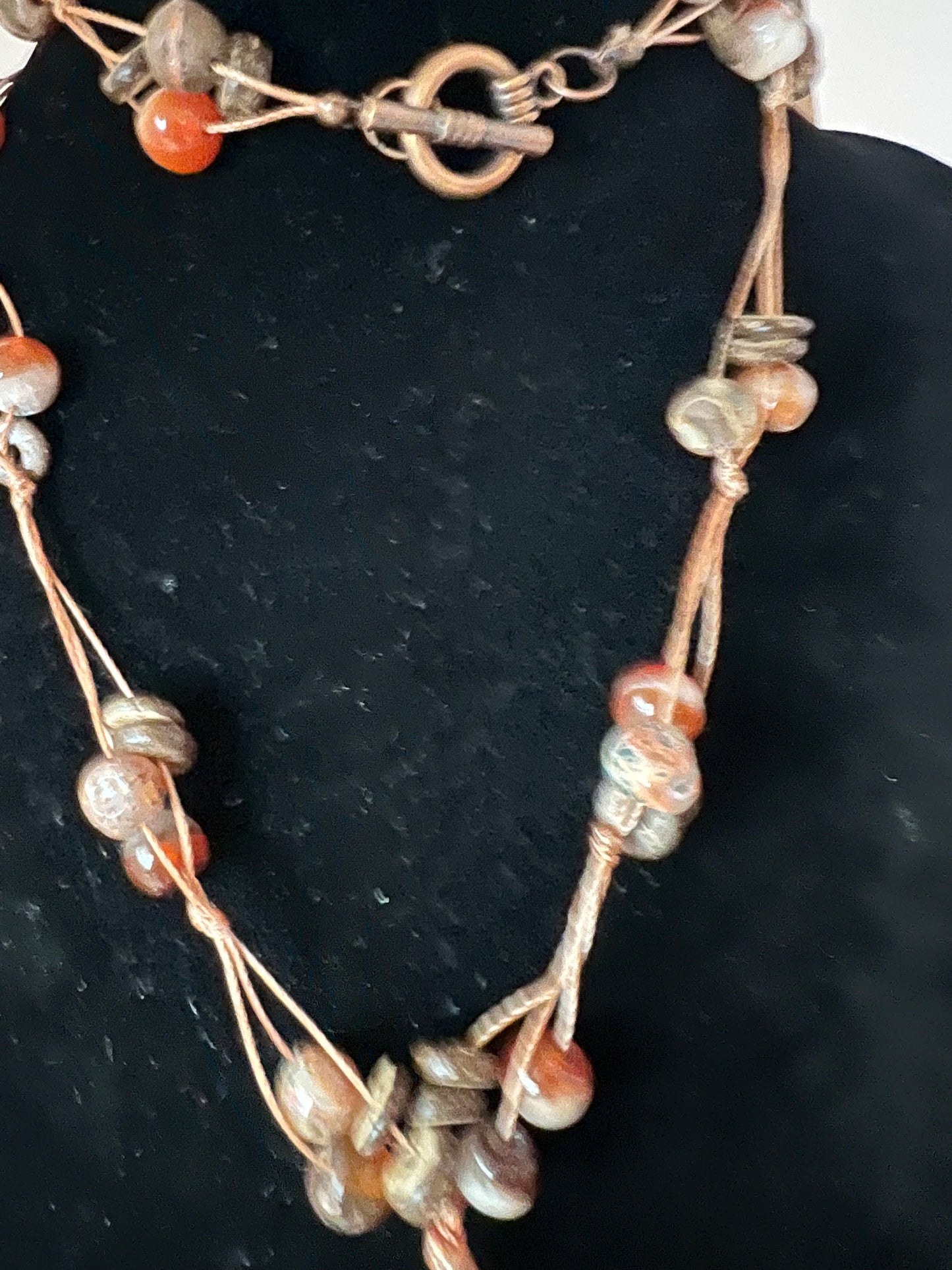 28 inch Knotted Cord Necklace with Coconut Shell Wood, Copper Leaf and Red Agate