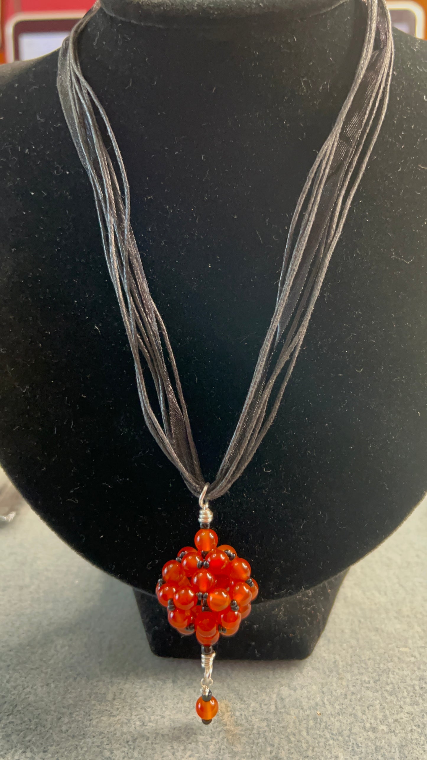 Carnelian Handmade Bead Focal on Ribbon and Cord Black