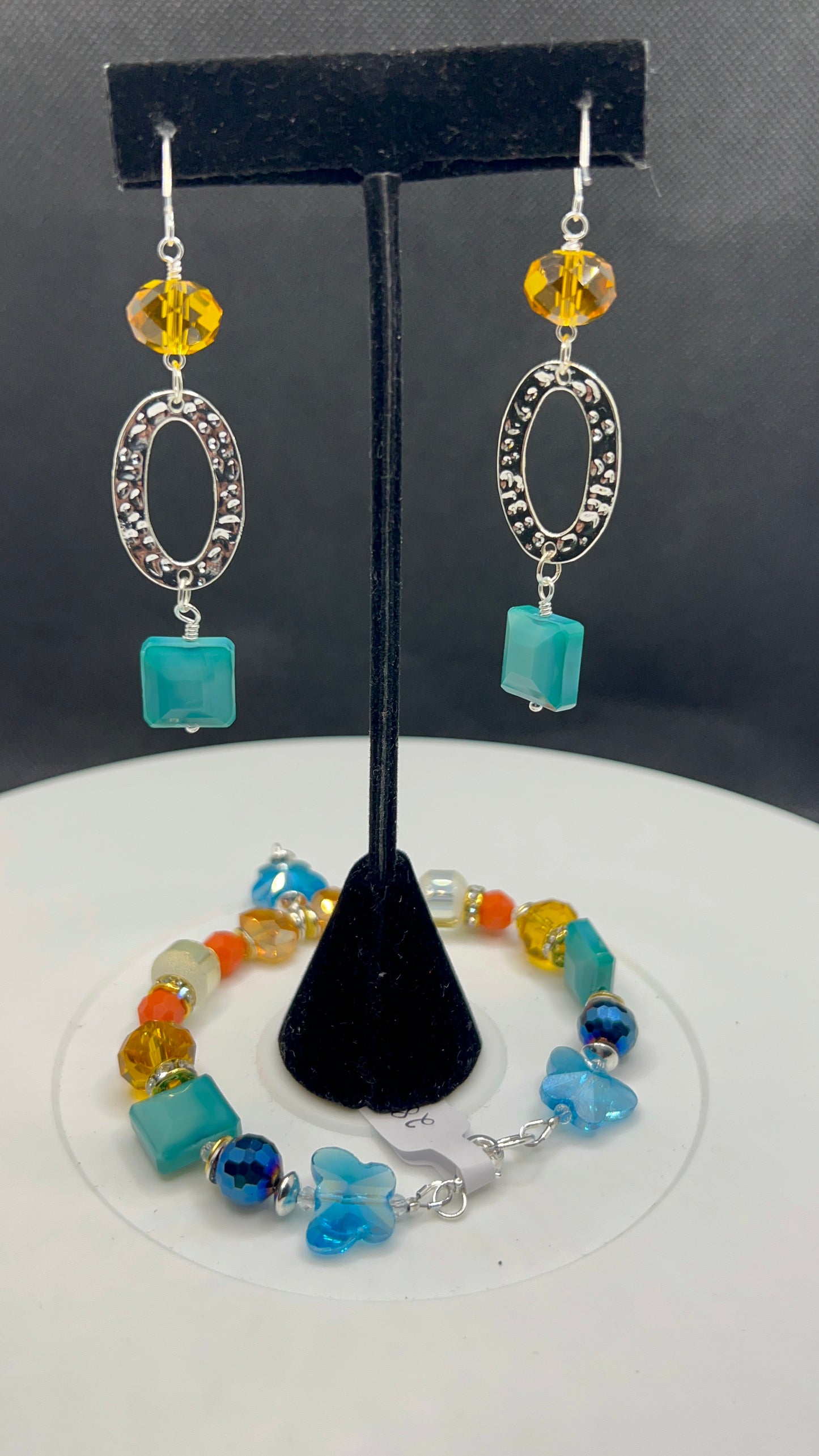 Rainbow Wave - turquoise, royal blue, orange, white, amber, butterfly, bling and yellow crystal with silver bracelet and matching oval Earrings with turquoise and Amber crystals