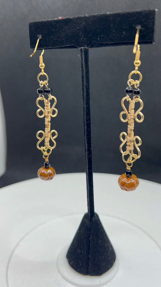 Golden Woven Long Earrings with Pumpkins and Black Beads