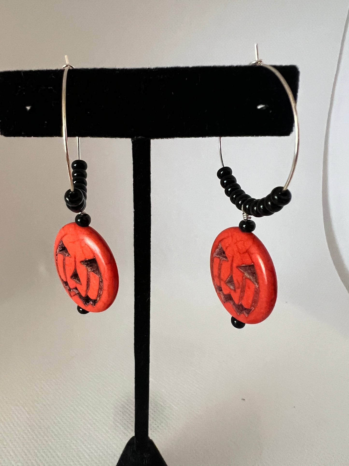 Pumpkin Earrings with Black Beads on silver hoops