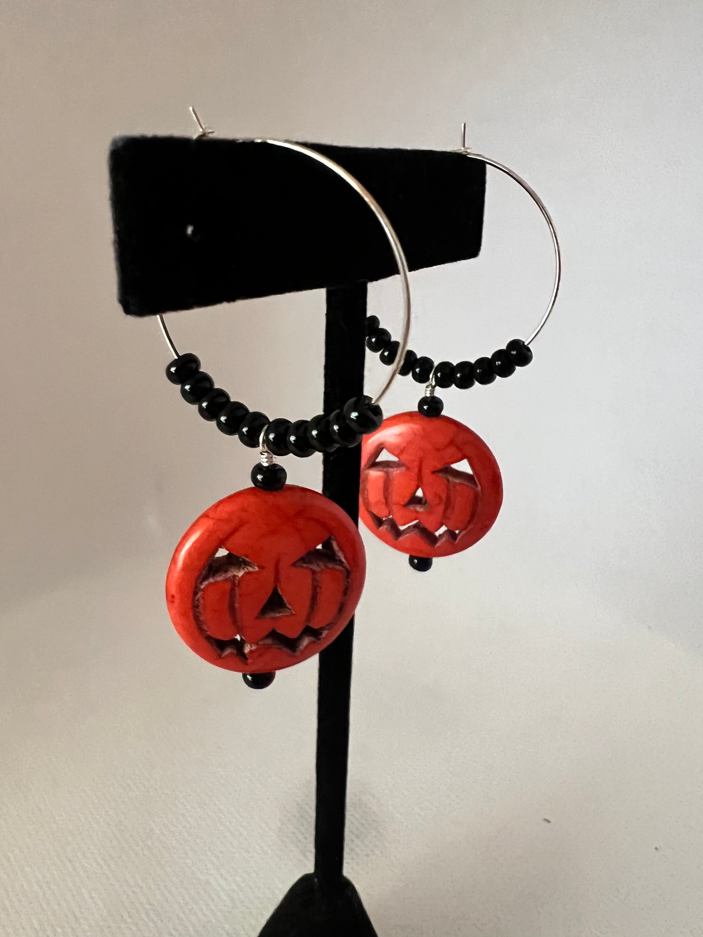 Pumpkin Earrings with Black Beads on silver hoops