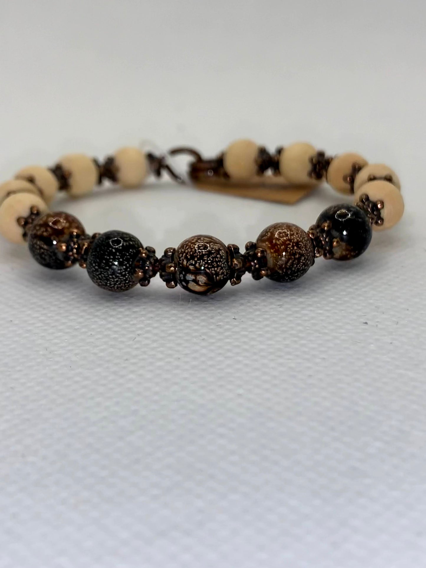 Wood and speckled brown beaded bracelet