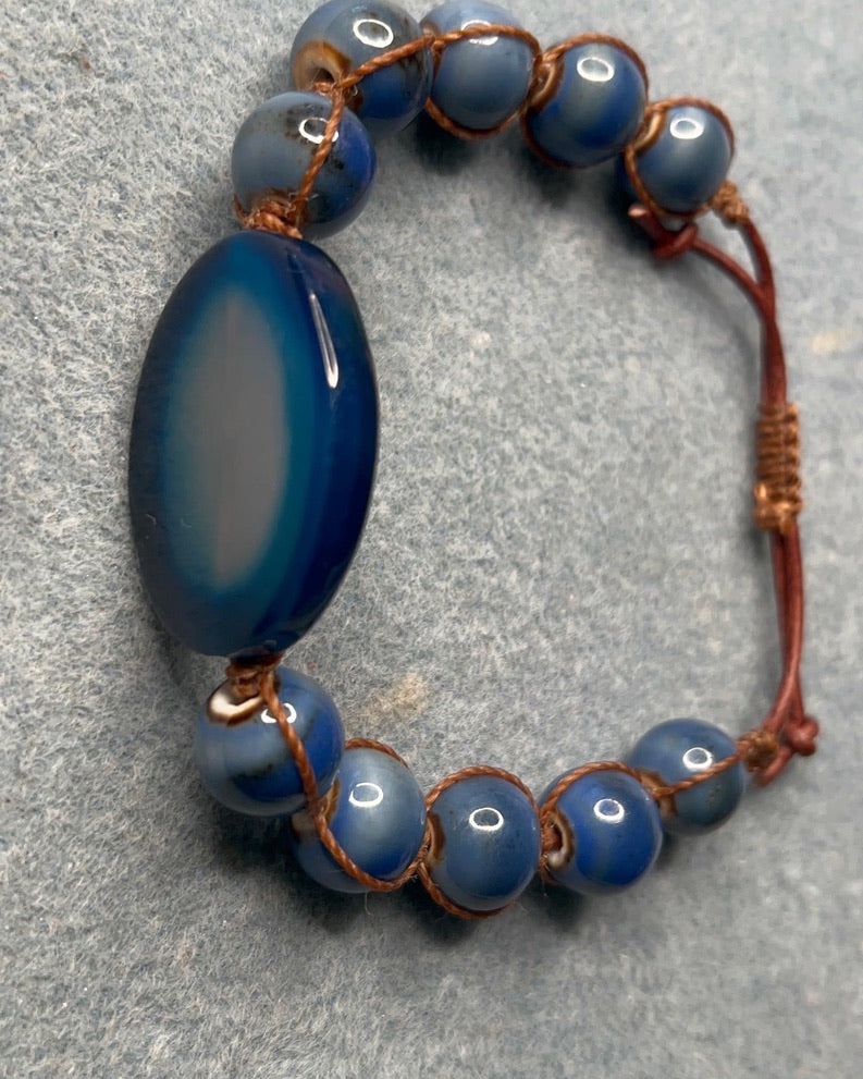 Blue Agate Oval focal with ceramic beads on leather Adjustable Bracelet