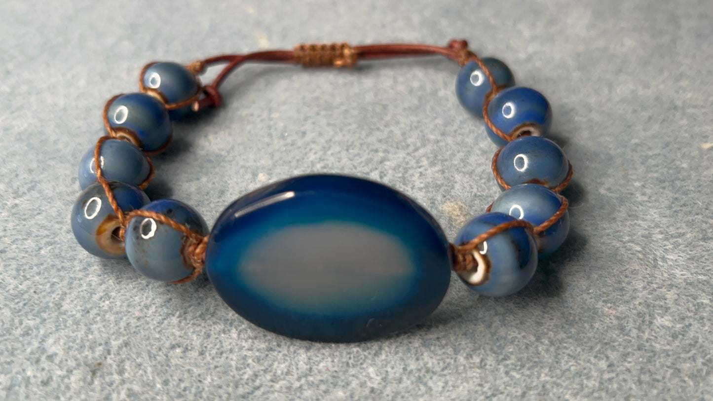 Blue Agate Oval focal with ceramic beads on leather Adjustable Bracelet