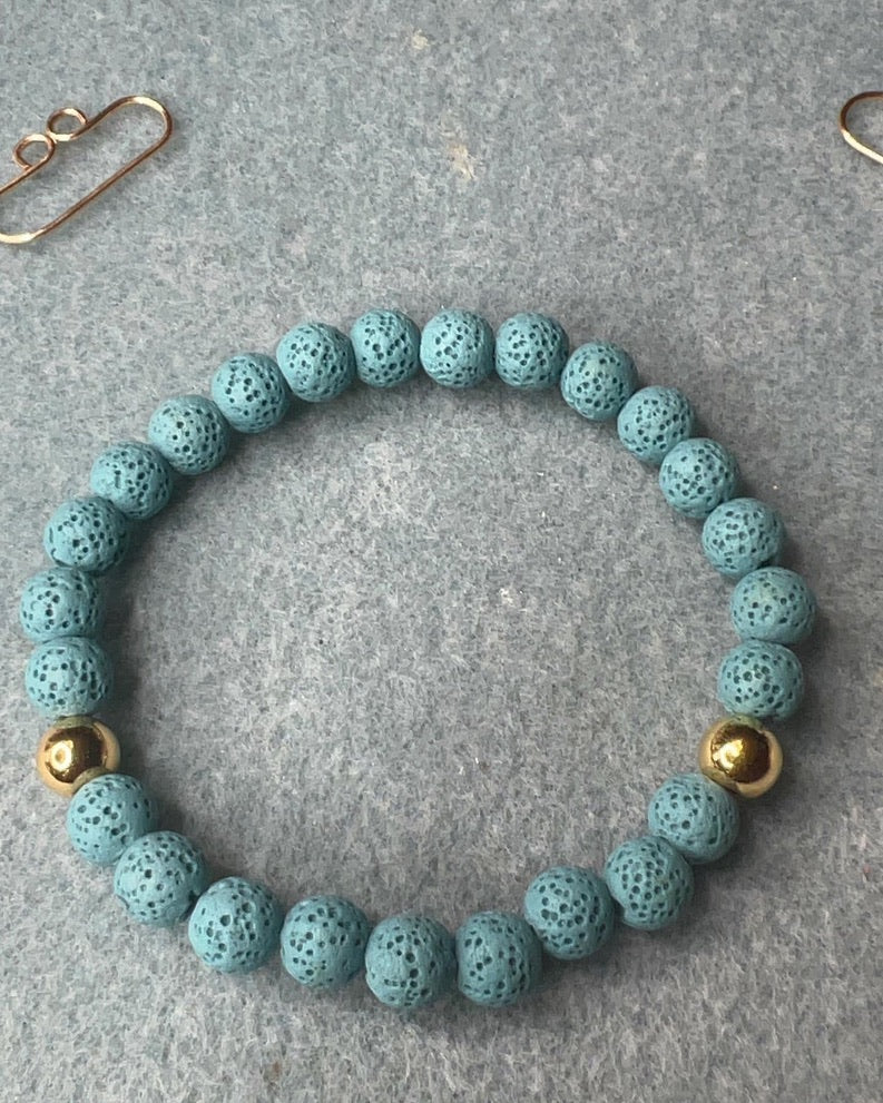 Carolina Blue 8mm Lava Beads with Gold beads Stretch Bracelet